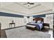 Spacious main bedroom with tray ceiling and neutral decor at 12999 Deerstyne Green St, Carmel, IN 46032