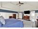This spacious bedroom provides a tranquil space with walk-in closet and bath access at 12999 Deerstyne Green St, Carmel, IN 46032