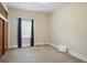 This bedroom features plush carpeting and closet space at 1331 S 9Th St, Noblesville, IN 46060