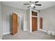 Cozy bedroom features plush carpeting, fresh paint, and convenient closet space at 1331 S 9Th St, Noblesville, IN 46060