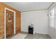 Cozy entryway with wood-paneled accent wall, front door, and neutral-toned flooring at 1331 S 9Th St, Noblesville, IN 46060