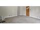 Spacious living room featuring neutral walls, carpeted floors, and open entryway at 1331 S 9Th St, Noblesville, IN 46060