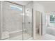 Bathroom featuring a walk-in shower with white marble tile and a view into the water closet and bedroom at 1354 Sambar Ct, Greenwood, IN 46143
