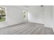 Bright bedroom featuring plush carpet and white trim with two large windows offering plenty of natural light at 1354 Sambar Ct, Greenwood, IN 46143