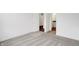 A cozy bedroom with plush carpeting, showing a half-bathroom nearby at 1354 Sambar Ct, Greenwood, IN 46143
