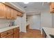Well-maintained kitchen with wood cabinets, countertop space, and convenient layout offers modern appliances at 150 Dominion Dr, Zionsville, IN 46077