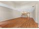 Open-concept living area with hardwood floors and a kitchen bar, great for entertaining and everyday living at 150 Dominion Dr, Zionsville, IN 46077