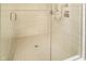 Modern shower with tile flooring and walls, and glass door enclosure at 1818 Central Ave, Indianapolis, IN 46202