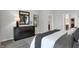 This primary bedroom features soft carpet, modern furniture, and stylish decor at 19348 Mcbee Ave, Westfield, IN 46074
