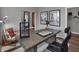 Bright home office featuring stylish desk, modern decor, comfortable seating, and ample space for productivity at 19348 Mcbee Ave, Westfield, IN 46074