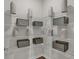 Well-organized pantry with metal shelving filled with decorative jars and containers at 19348 Mcbee Ave, Westfield, IN 46074