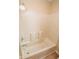A clean white shower and tub combo with chrome fixtures in a bright bathroom at 22620 Lamong Rd, Sheridan, IN 46069