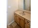 Bathroom with vanity, a mirror, and tan cabinets, offering plenty of storage space at 22620 Lamong Rd, Sheridan, IN 46069