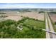 Panoramic aerial shot showcasing the property's proximity to highways and the surrounding farmland at 2708 N 400 E, Greenfield, IN 46140