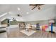 Bonus room with a ceiling fan, hardwood floors, and a toy area at 2708 N 400 E, Greenfield, IN 46140