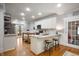 Bright kitchen with stainless steel appliances, granite countertops, and a convenient breakfast bar at 2708 N 400 E, Greenfield, IN 46140