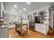 Spacious kitchen with modern appliances, stainless steel refrigerator, and convenient island prep area at 2708 N 400 E, Greenfield, IN 46140