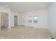 Bright and airy living room with light wood floors, neutral walls, and natural light at 2909 E Michigan St, Indianapolis, IN 46201
