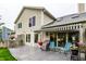 Charming backyard with a deck, chairs, and awning, perfect for relaxation and entertaining at 2949 River Bay N Dr, Indianapolis, IN 46240