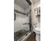 Bathroom features tile and stone shower with glass doors, modern fixtures and a comfortable toilet at 2949 River Bay N Dr, Indianapolis, IN 46240