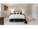 A well-lit bedroom featuring classic decor and a soft, neutral color palette at 2949 River Bay N Dr, Indianapolis, IN 46240