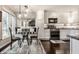 Charming breakfast nook featuring a built-in bench and modern lighting in kitchen at 2949 River Bay N Dr, Indianapolis, IN 46240