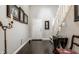 Bright foyer with beautiful hardwood floors, elegant decor and stairway access at 2949 River Bay N Dr, Indianapolis, IN 46240