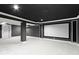 Finished basement featuring a large movie screen, plush carpet, and neutral paint at 3014 Saddlehorn Dr, Carmel, IN 46033