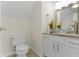 Stylish half-bathroom with a vessel sink, granite countertop, and modern fixtures at 3014 Saddlehorn Dr, Carmel, IN 46033