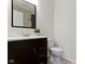 Bathroom featuring a dark vanity and neutral walls at 3014 Saddlehorn Dr, Carmel, IN 46033