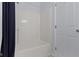 Bathtub has walls and a shower curtain at 3014 Saddlehorn Dr, Carmel, IN 46033