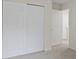 This bedroom has a closet and access door, plus neutral walls and carpet at 3014 Saddlehorn Dr, Carmel, IN 46033