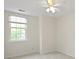 Bright bedroom with natural light, neutral walls and carpet, and ceiling fan at 3014 Saddlehorn Dr, Carmel, IN 46033