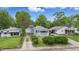 Aerial view of a neighborhood with mature trees and well-maintained yards, offering a peaceful setting at 3334 N Chester Ave, Indianapolis, IN 46218