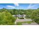 Aerial view of a residential neighborhood with tree-lined streets and charming single-Gathering homes at 3334 N Chester Ave, Indianapolis, IN 46218