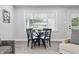Inviting dining area with a modern table, comfortable seating, and plenty of natural light at 3334 N Chester Ave, Indianapolis, IN 46218