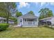 Attractive single Gathering home with a cozy front porch and a well manicured lawn at 3334 N Chester Ave, Indianapolis, IN 46218