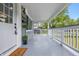 Inviting porch with a welcome mat, decorative plants, and bright, airy feel at 3334 N Chester Ave, Indianapolis, IN 46218