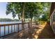 Spacious wooden deck overlooking the lake, perfect for outdoor relaxation and entertaining at 3585 Bay Rd N Dr, Indianapolis, IN 46240