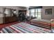 Bright bedroom with two beds, a desk, and a window overlooking the lake at 3585 Bay Rd N Dr, Indianapolis, IN 46240