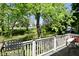 Scenic back porch view with lush, green backyard scenery at 3668 Chatsbee Ct, Indianapolis, IN 46224