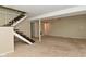Large basement space with stairs, offering potential for recreation or storage at 3668 Chatsbee Ct, Indianapolis, IN 46224