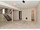 Open basement space with stair access, perfect for renovation at 3668 Chatsbee Ct, Indianapolis, IN 46224