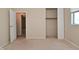 Neutral bedroom features carpeted floor, closet for storage, and window for natural light at 3668 Chatsbee Ct, Indianapolis, IN 46224