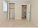 A small bedroom with a closet and an open door at 3668 Chatsbee Ct, Indianapolis, IN 46224