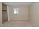 Neutral bedroom features carpeted floor, closet for storage, and window for natural light at 3668 Chatsbee Ct, Indianapolis, IN 46224