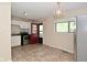 Bright kitchen features stainless steel appliances, white cabinetry, and an eat in area at 3668 Chatsbee Ct, Indianapolis, IN 46224