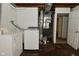 Functional laundry room, with exposed mechanics and newer washer/dryer at 3668 Chatsbee Ct, Indianapolis, IN 46224