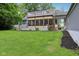 The home's backyard features a porch and deck offering a tranquil outdoor setting with plenty of room for seating at 3713 W 98Th St, Carmel, IN 46032