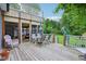 Entertain on this open deck just outside a screened in porch, perfect for grilling and dining at 3713 W 98Th St, Carmel, IN 46032